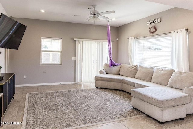 living room featuring baseboards, tile patterned flooring, a ceiling fan, and recessed lighting