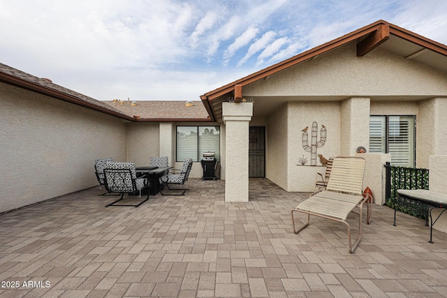 view of patio featuring outdoor dining space