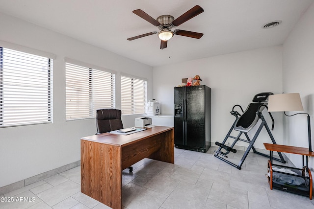 office featuring visible vents, ceiling fan, and baseboards