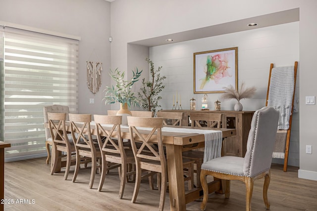 dining space featuring wood finished floors