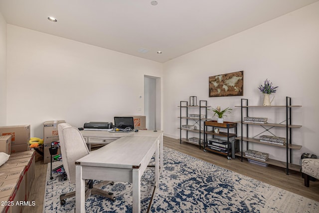 home office featuring recessed lighting, baseboards, and wood finished floors