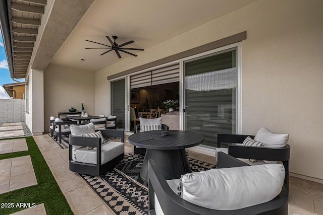 view of patio featuring outdoor dining area, ceiling fan, and outdoor lounge area