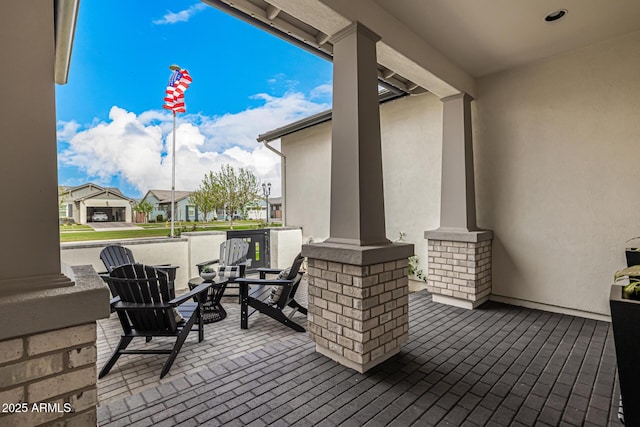 view of patio / terrace with a residential view