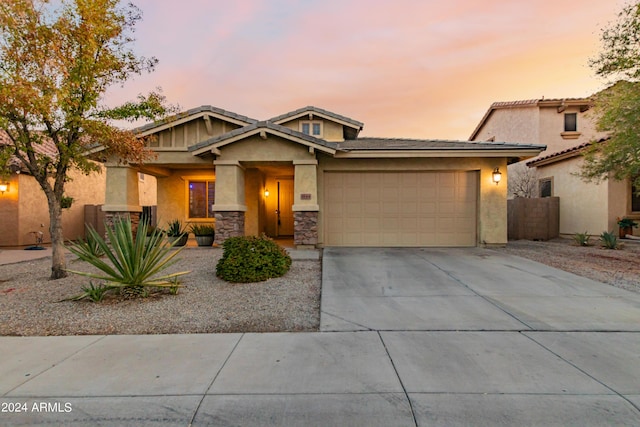 view of front of home with a garage