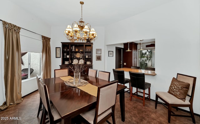 dining area with a chandelier