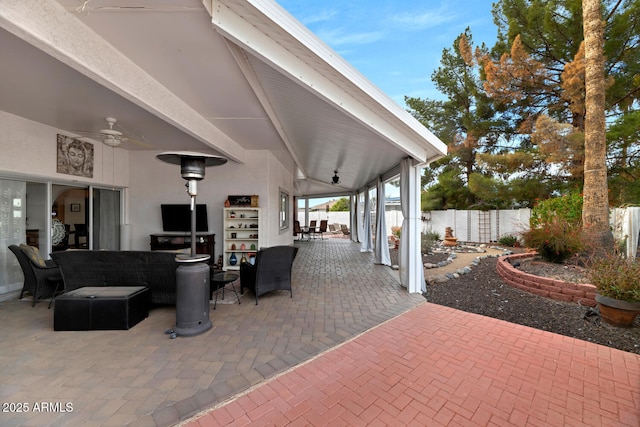 view of patio / terrace featuring an outdoor living space and ceiling fan