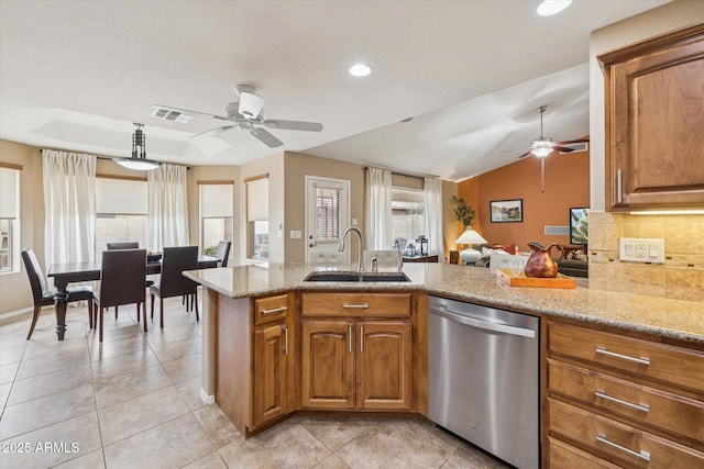 11320 E Newcastle Ave, Mesa, AZ 85209 - kitchen with dishwasher, a sink, a ceiling fan, brown cabinetry, and recessed lighting