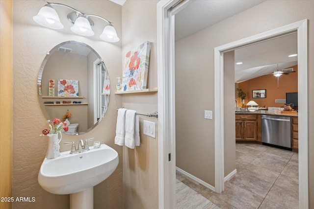 11320 E Newcastle Ave, Mesa, AZ 85209 - bathroom with ceiling fan, tile patterned flooring, a sink, and vaulted ceiling