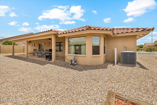 11320 E Newcastle Ave, Mesa, AZ 85209 - rear view of house featuring central AC, stucco siding, a ceiling fan, and a patio