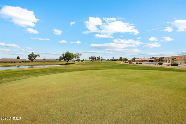 11320 E Newcastle Ave, Mesa, AZ 85209 - view of home's community with a water view, view of golf course, and a yard