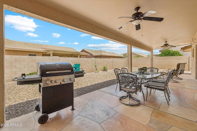 11320 E Newcastle Ave, Mesa, AZ 85209 - fenced backyard with outdoor dining space, a ceiling fan, a patio, and grilling area