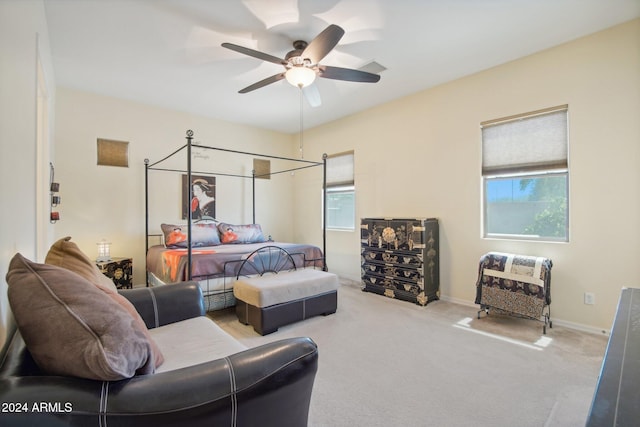 carpeted bedroom featuring ceiling fan