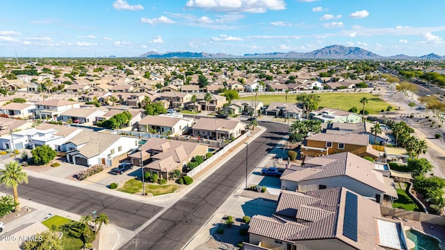 aerial view of residential area with mountains