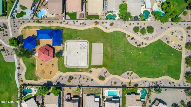 aerial view of property and surrounding area featuring property boundaries highlighted