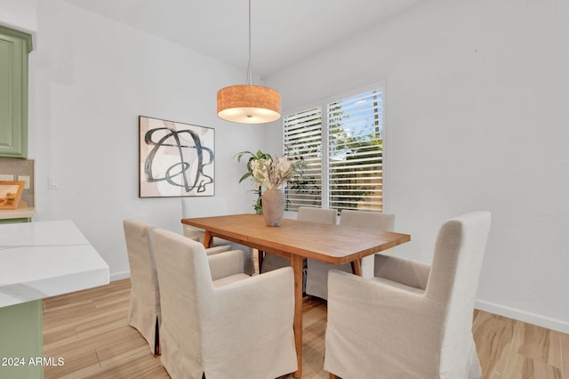 dining space featuring light hardwood / wood-style floors