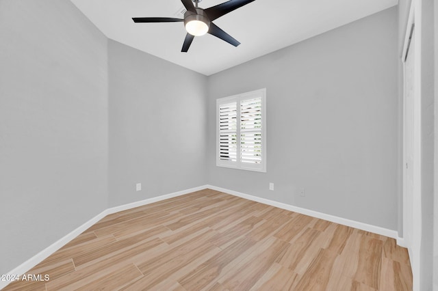 unfurnished room featuring ceiling fan and light hardwood / wood-style flooring