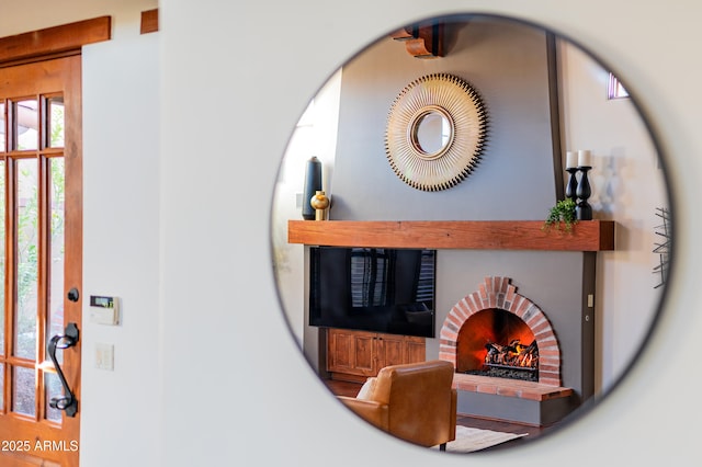 room details featuring a brick fireplace