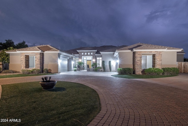 prairie-style home with a garage