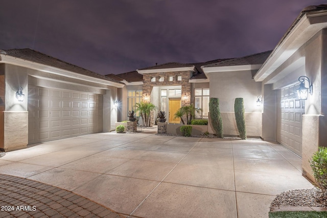 view of front of property featuring a garage