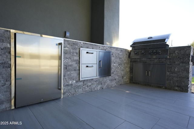 view of patio / terrace with a grill