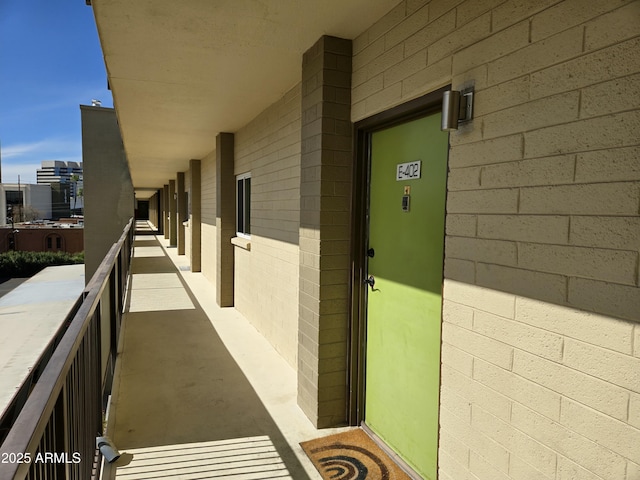 entrance to property with a balcony