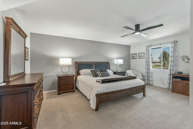 bedroom with light colored carpet and ceiling fan