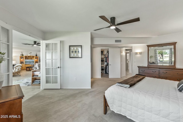 carpeted bedroom featuring visible vents, french doors, and baseboards