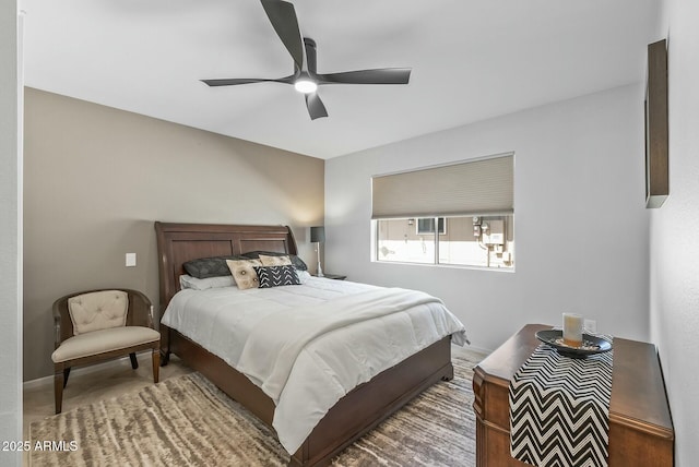 bedroom with baseboards, carpet floors, and ceiling fan