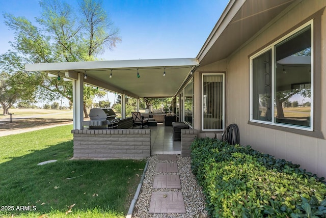 view of patio / terrace featuring a grill and an outdoor hangout area