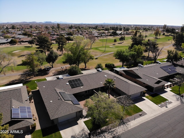 drone / aerial view featuring a residential view and view of golf course