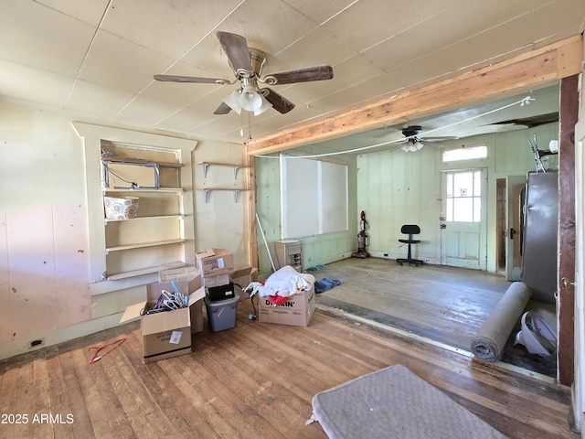 interior space featuring hardwood / wood-style flooring and ceiling fan