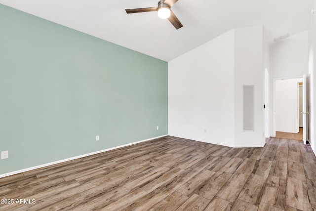 3044 E Sparrow Pl, Chandler, AZ 85286 - empty room featuring high vaulted ceiling, a ceiling fan, baseboards, wood finished floors, and visible vents