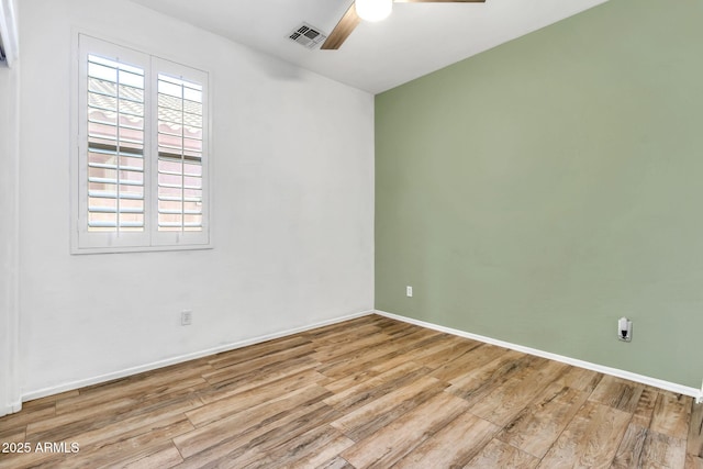 3044 E Sparrow Pl, Chandler, AZ 85286 - spare room featuring baseboards, ceiling fan, wood finished floors, and visible vents