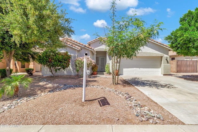 3044 E Sparrow Pl, Chandler, AZ 85286 - view of front of property with a garage, fence, stucco siding, driveway, and a tile roof