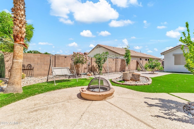 3044 E Sparrow Pl, Chandler, AZ 85286 - view of patio / terrace featuring fence and a fire pit