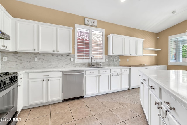 3044 E Sparrow Pl, Chandler, AZ 85286 - kitchen with a sink, tasteful backsplash, open shelves, and stainless steel appliances