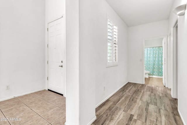 3044 E Sparrow Pl, Chandler, AZ 85286 - hallway with light tile patterned flooring and baseboards