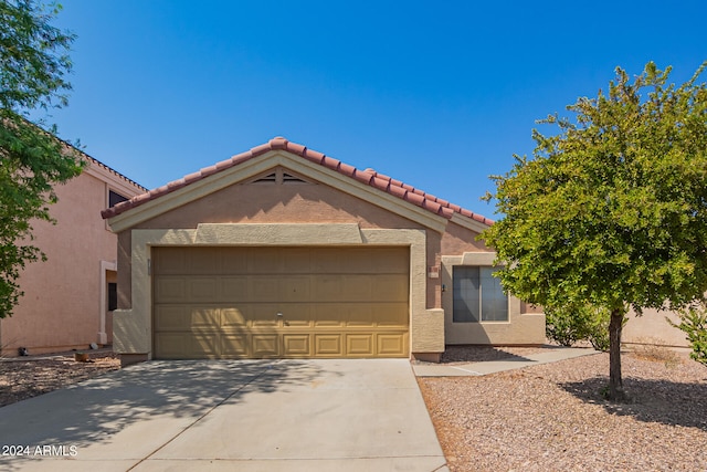 view of front of property featuring a garage