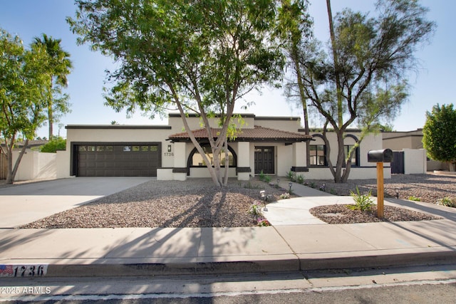1736 N Ashbrook Cir, Mesa, AZ 85213 - mediterranean / spanish-style home featuring stucco siding, driveway, a garage, and a tiled roof