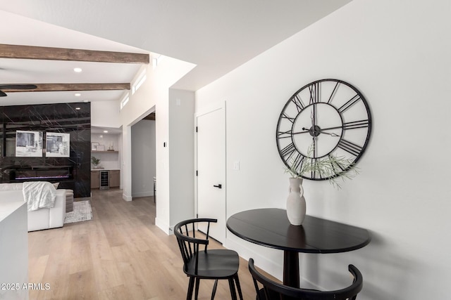 1736 N Ashbrook Cir, Mesa, AZ 85213 - dining room with light wood-style flooring, beamed ceiling, wine cooler, and recessed lighting