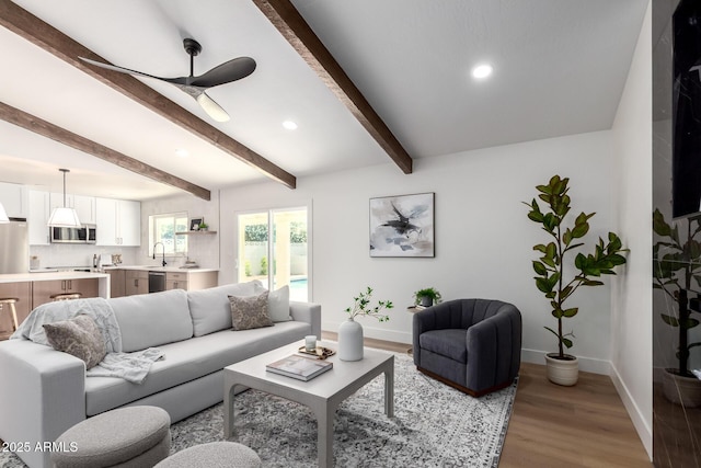 1736 N Ashbrook Cir, Mesa, AZ 85213 - living room with baseboards, light wood-style floors, recessed lighting, beamed ceiling, and ceiling fan