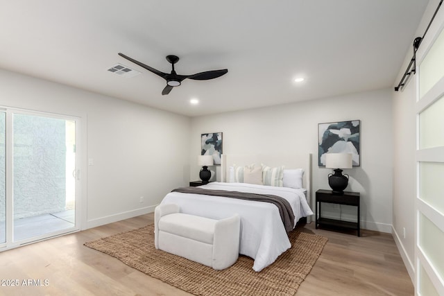 1736 N Ashbrook Cir, Mesa, AZ 85213 - bedroom featuring access to outside, light wood-style flooring, multiple windows, ceiling fan, and recessed lighting