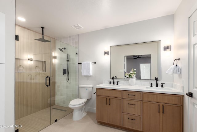 1736 N Ashbrook Cir, Mesa, AZ 85213 - bathroom featuring a shower stall, double vanity, and toilet