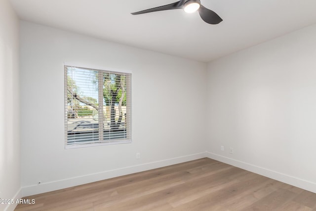 1736 N Ashbrook Cir, Mesa, AZ 85213 - spare room with ceiling fan, light wood-type flooring, and baseboards