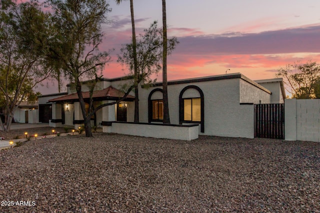 1736 N Ashbrook Cir, Mesa, AZ 85213 - back of house with a gate and stucco siding