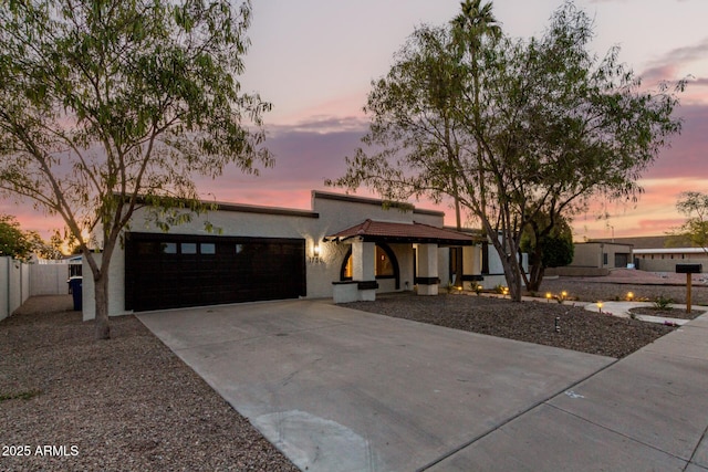 1736 N Ashbrook Cir, Mesa, AZ 85213 - mid-century home featuring a garage, concrete driveway, and stucco siding