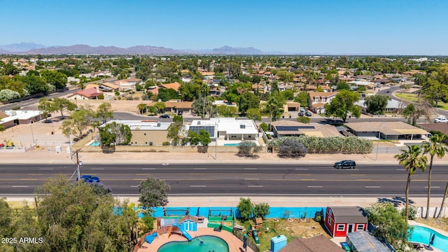 1736 N Ashbrook Cir, Mesa, AZ 85213 - aerial perspective of suburban area featuring a pool area and mountains