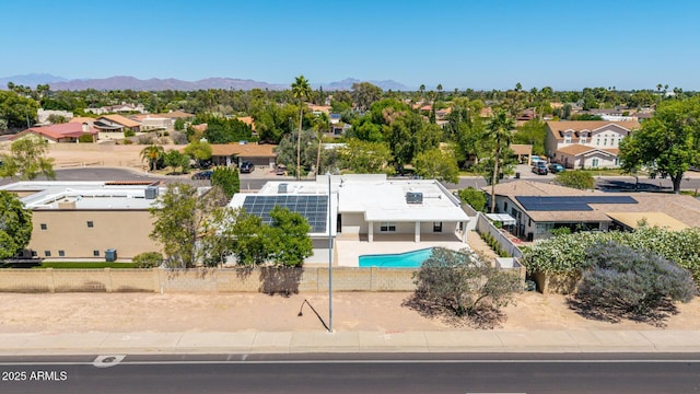 1736 N Ashbrook Cir, Mesa, AZ 85213 - aerial view of residential area with a pool area and a mountainous background