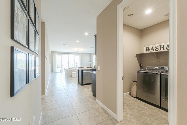 37903 W San Clemente St, Maricopa, AZ 85138 - clothes washing area with washing machine and clothes dryer, light tile patterned floors, baseboards, and recessed lighting