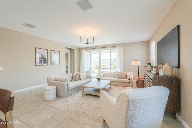 37903 W San Clemente St, Maricopa, AZ 85138 - living area featuring baseboards, a chandelier, and light tile patterned floors
